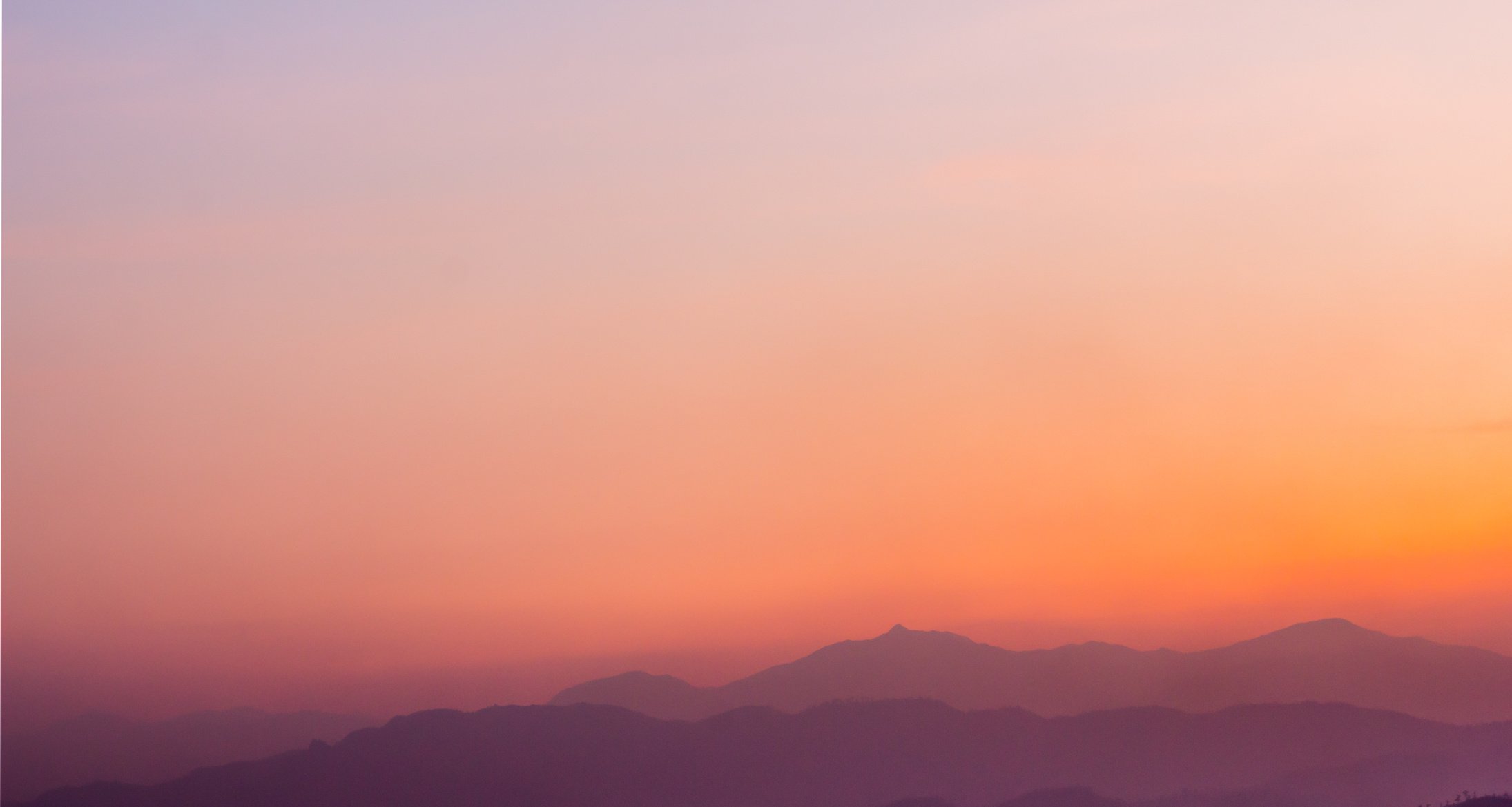 Mountains Against the Twilight Sky Background